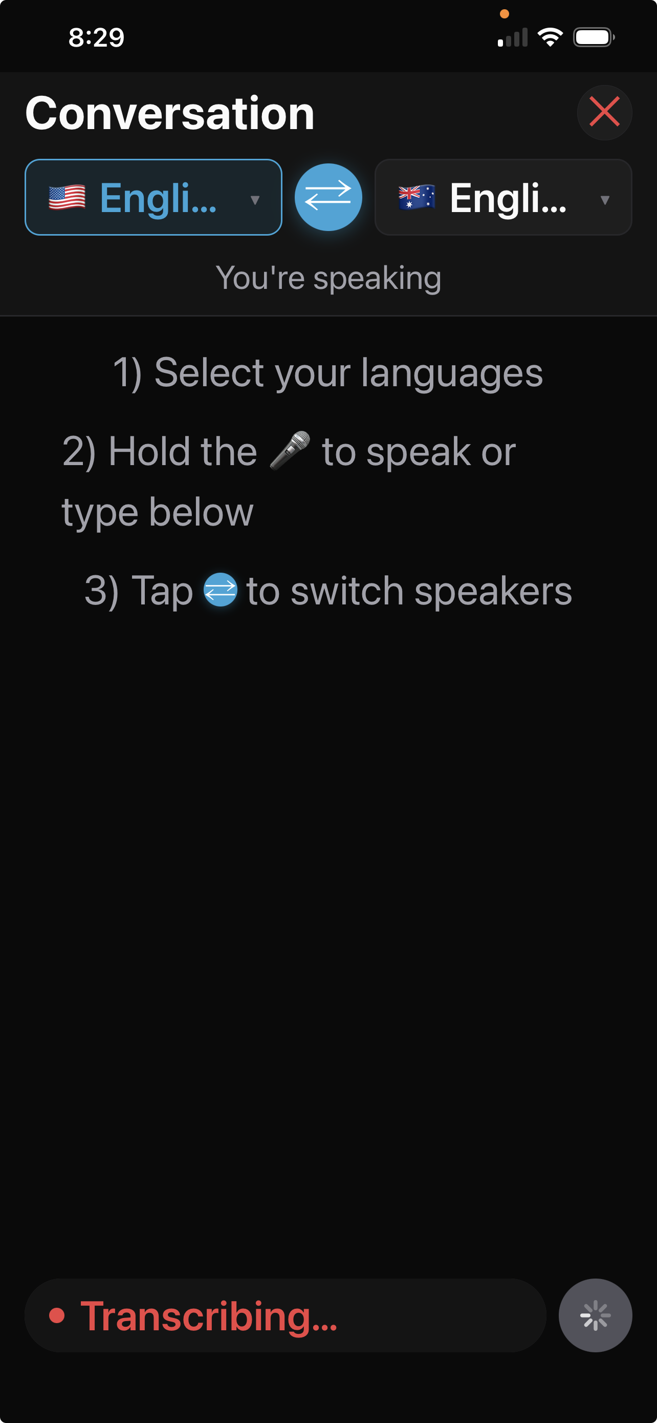 Conversation screen showing a Transcribing state